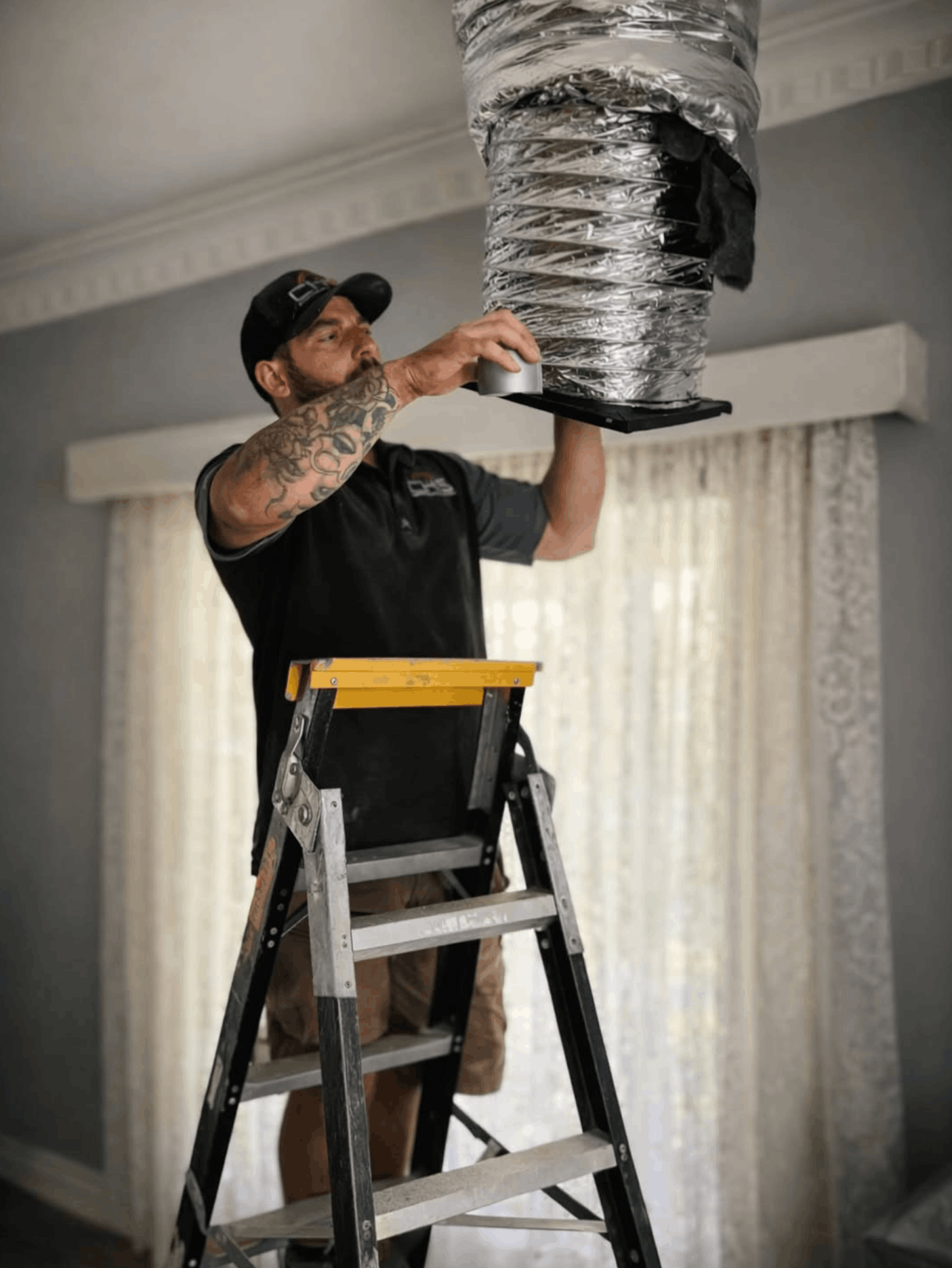 CHS sealing a ducted air conditioning vent in a Broken Hill lounge room